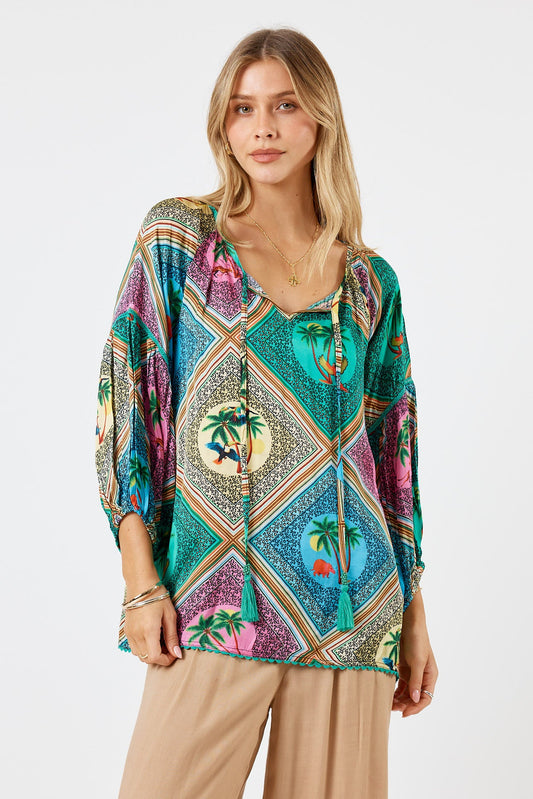 Image of a model wearing Tops. Product name - LulaSoul Windsor Top Sea in Sea colour by brand - LulaSoul