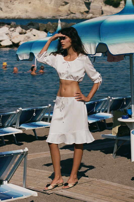 Image of a model wearing Tops. Product name - Maisie Top in White colour by brand - With Jéan