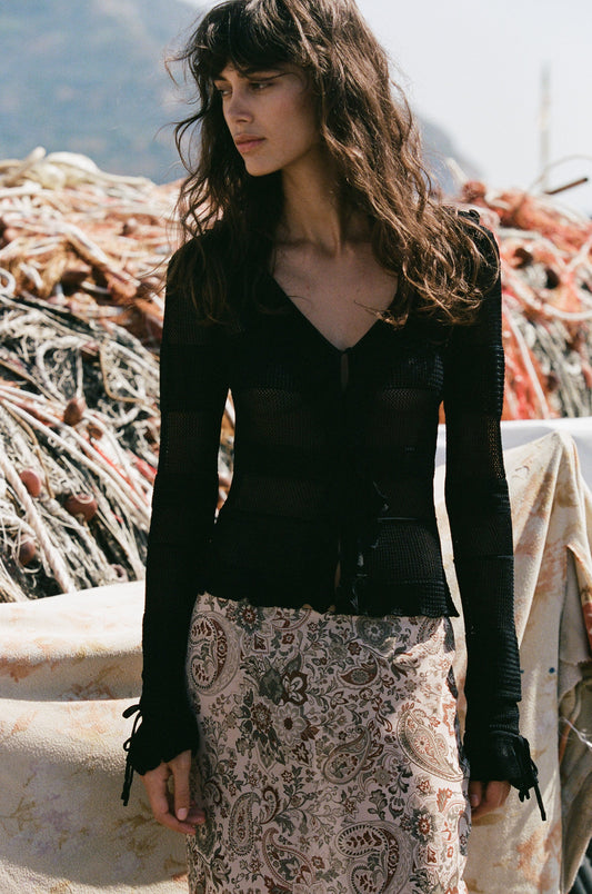 Image of a model wearing Tops. Product name - Malia Top in Black colour by brand - With Jéan