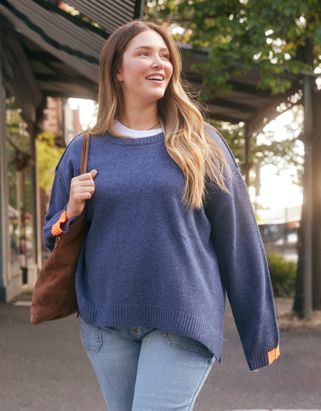 Image of a model wearing Outerwear. Product name - Marais Wool Cashmere Knit Denim in Denim colour by brand - White & Co.
