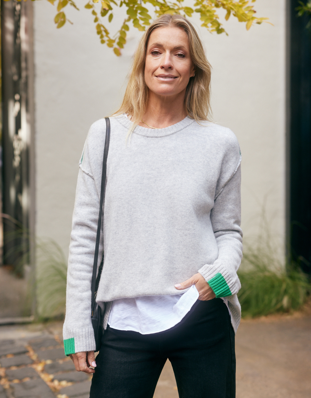 Image of a model wearing Outerwear. Product name - Marais Wool Cashmere Knit Grey Marle in Grey Marle colour by brand - White & Co.