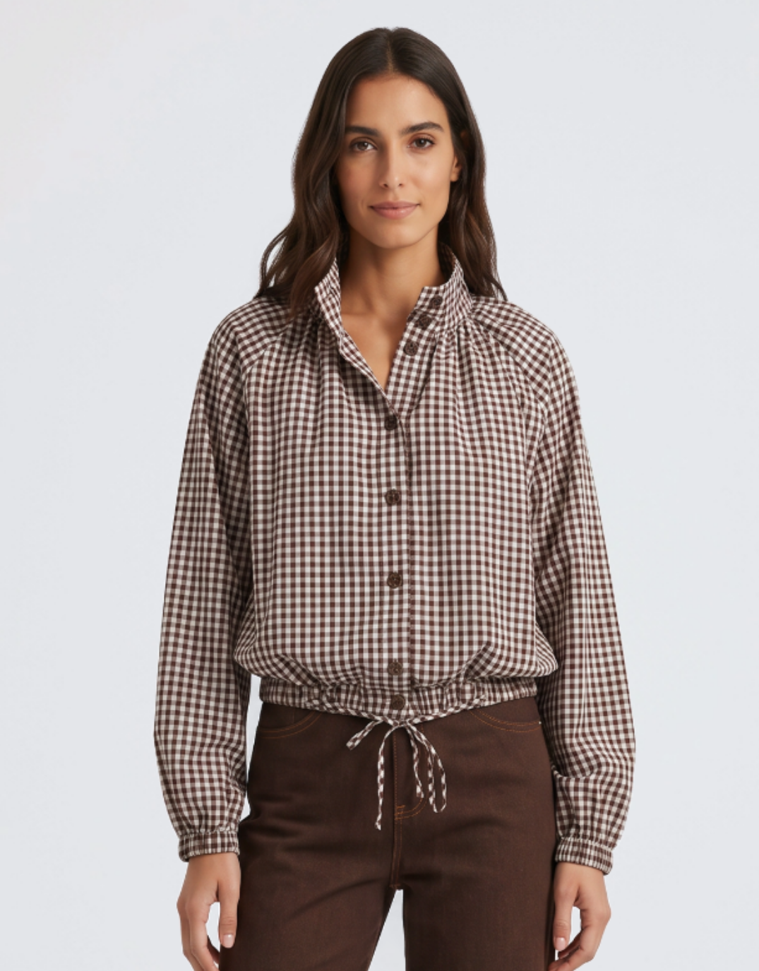 Image of a model wearing Outerwear. Product name - Margot Gathered Hem Shirt Choc/White in Choc/White colour by brand - 132 Fashion
