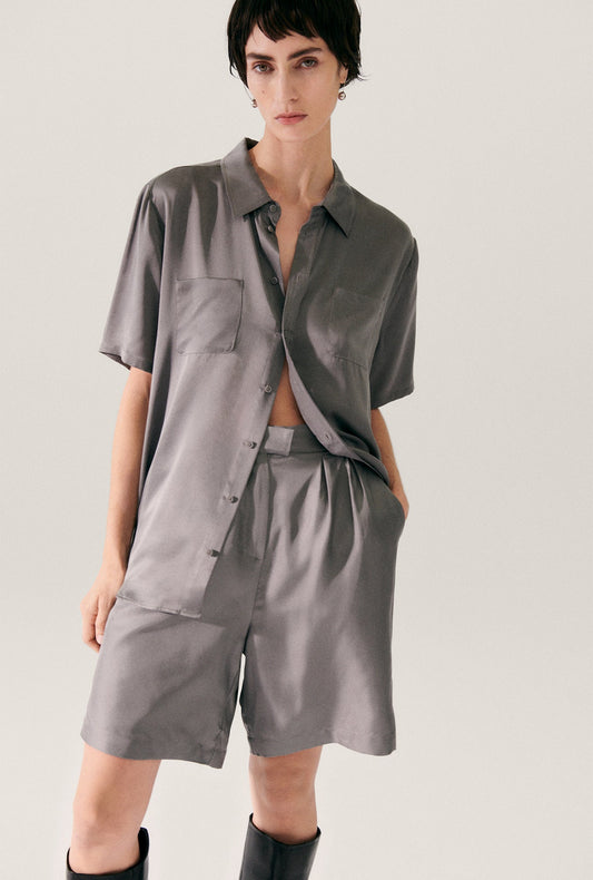 Image of a model wearing Tops. Productname: Short Sleeve Boyfriend Shirt Grey Pearl in Grey Pearl colour by brand - Silk Laundry