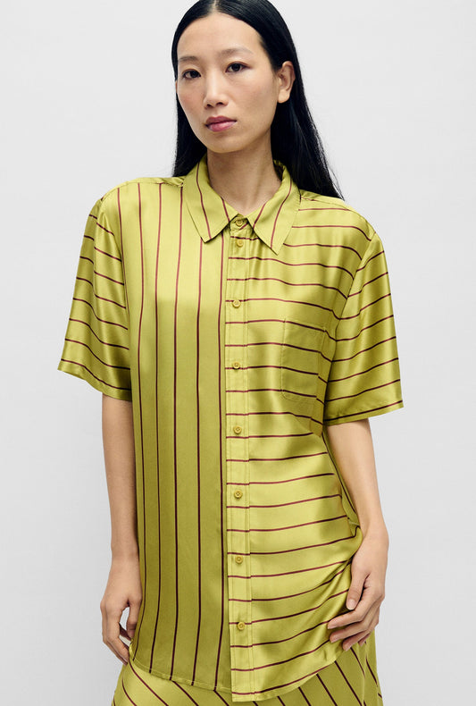 Image of a model wearing Tops. Productname: Short Sleeve Boyfriend Shirt Cactus Stripe in Cactus Stripe colour by brand - Silk Laundry