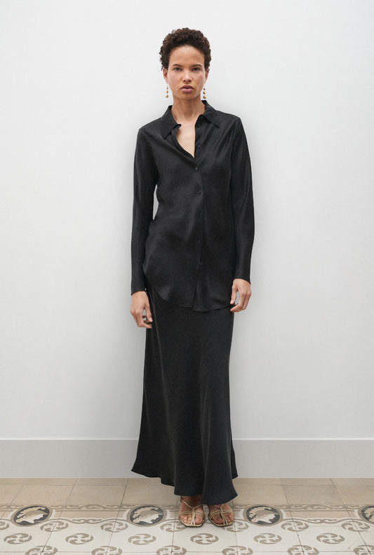 Image of a model wearing Tops. Productname: Silk Laundry BIAS CUT SHIRT in Black colour by brand - Silk Laundry