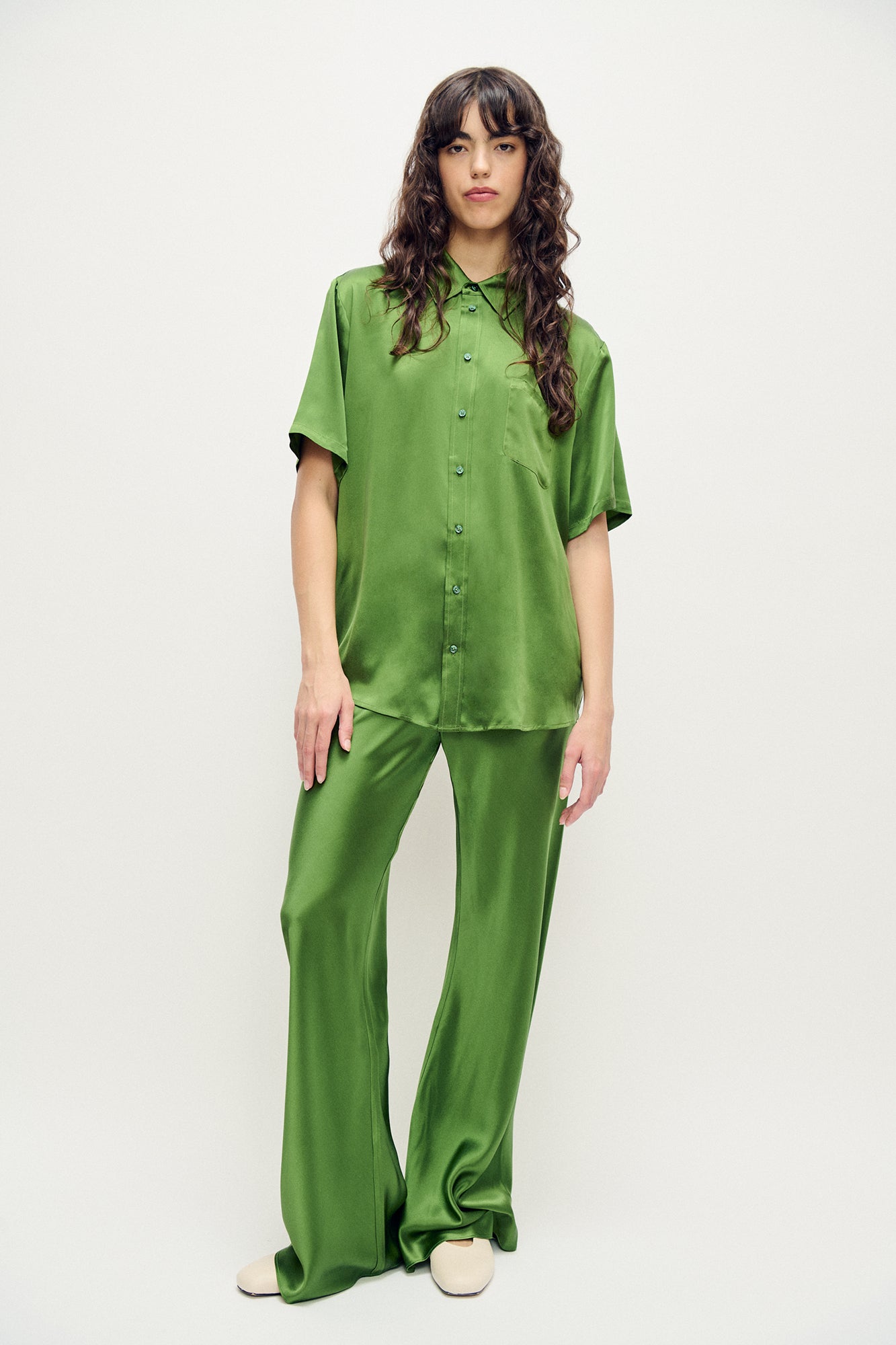 Image of a model wearing Tops. Product name - Short Sleeve Boyfriend Shirt Fields in Fields colour by brand - Silk Laundry