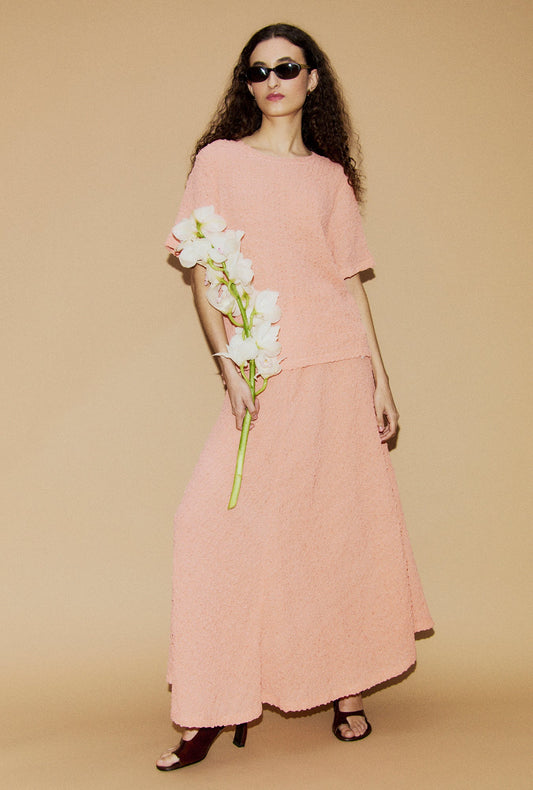 Image of a model wearing Skirts. Product name - Pebble Full Circle Skirt Orchid in Orchid colour by brand - Silk Laundry