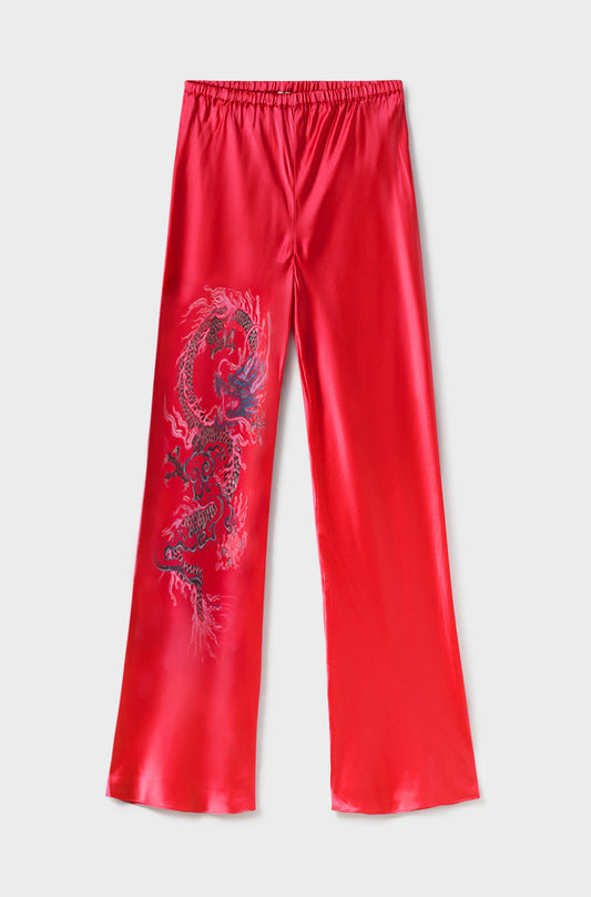Image of a model wearing Pants. Product name - Bias Cut Pants Year of The Dragon in Year Of The Dragon colour by brand - Silk Laundry