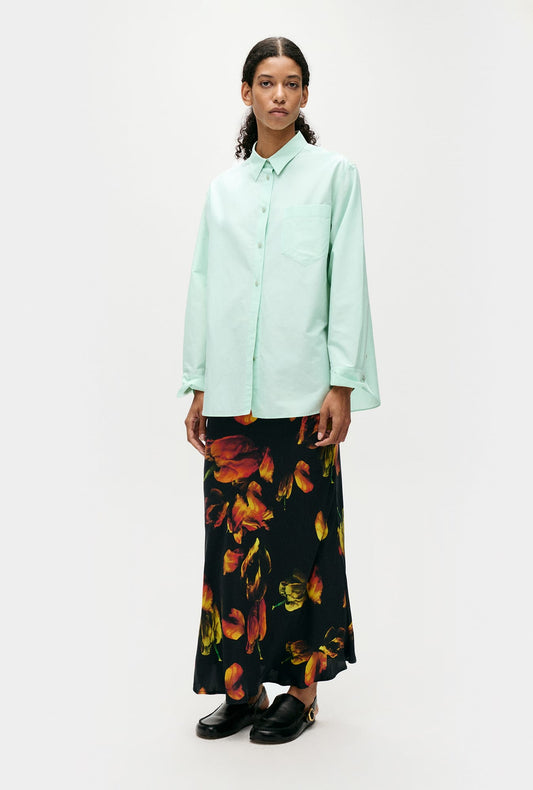 Image of a model wearing Tops. Productname: Silk Laundry Cotton Silk Pleated Yoke Shirt in Dew colour by brand - Silk Laundry