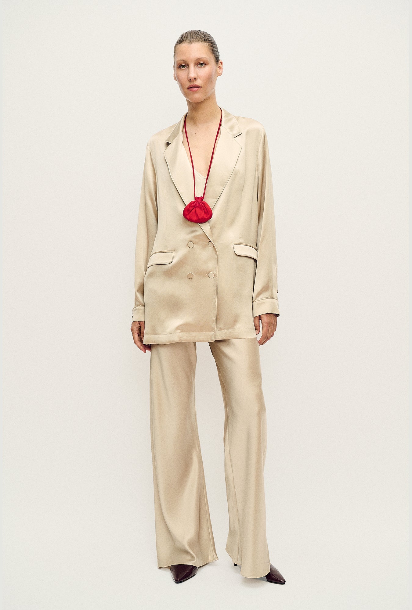 Image of a model wearing Outerwear. Product name - Relaxed Blazer Hazelnut in Hazelnut colour by brand - Silk Laundry