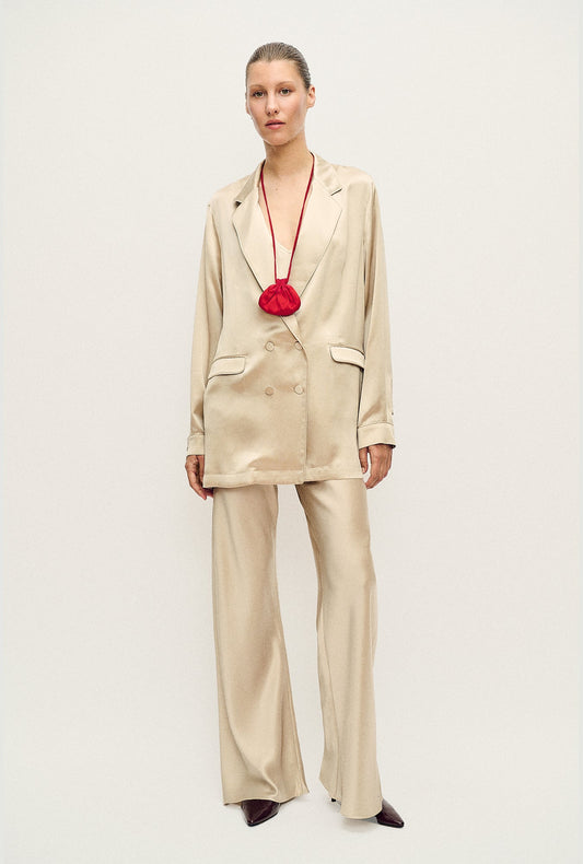 Image of a model wearing Outerwear. Product name - Relaxed Blazer Hazelnut in Hazelnut colour by brand - Silk Laundry