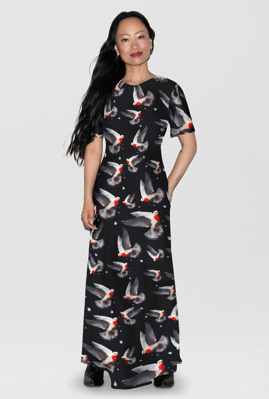 Image of a model wearing Tops. Product name - Short Sleeve Bias Dress Bleeding Dove in Bleeding Dove colour by brand - Silk Laundry