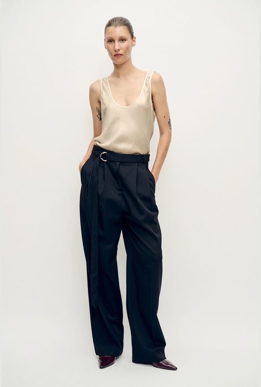Image of a model wearing Tops. Product name - Scoop Neck Tank Hazelnut in Hazelnut colour by brand - Silk Laundry