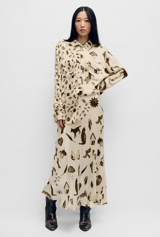 Image of a model wearing Skirts. Productname: Silk Laundry LONG BIAS CUT SKIRT in Miracles Hazelnut colour by brand - Silk Laundry