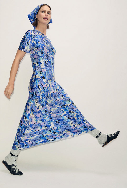 Image of a model wearing Tops. Product name - Short Sleeve Bias Dress Cornflower Floral in Cornflower Floral colour by brand - Silk Laundry