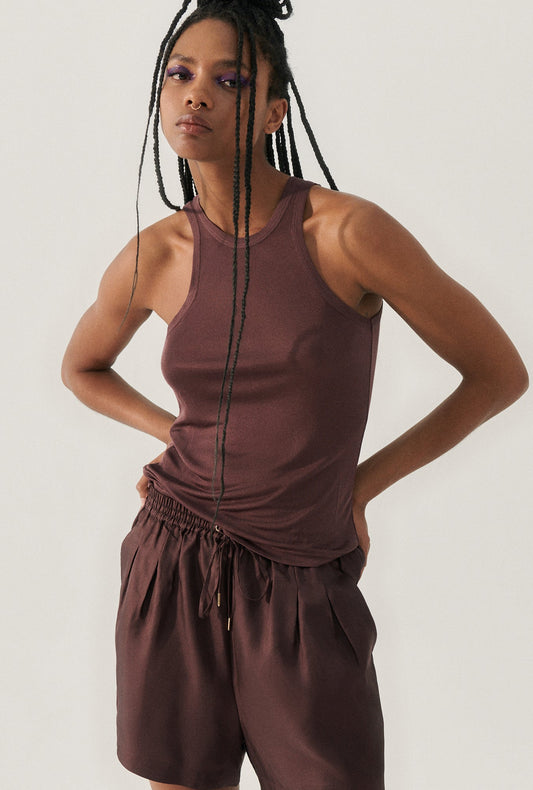 Image of a model wearing Tops. Product name - Jersey Tank Cacao in Cacao colour by brand - Silk Laundry