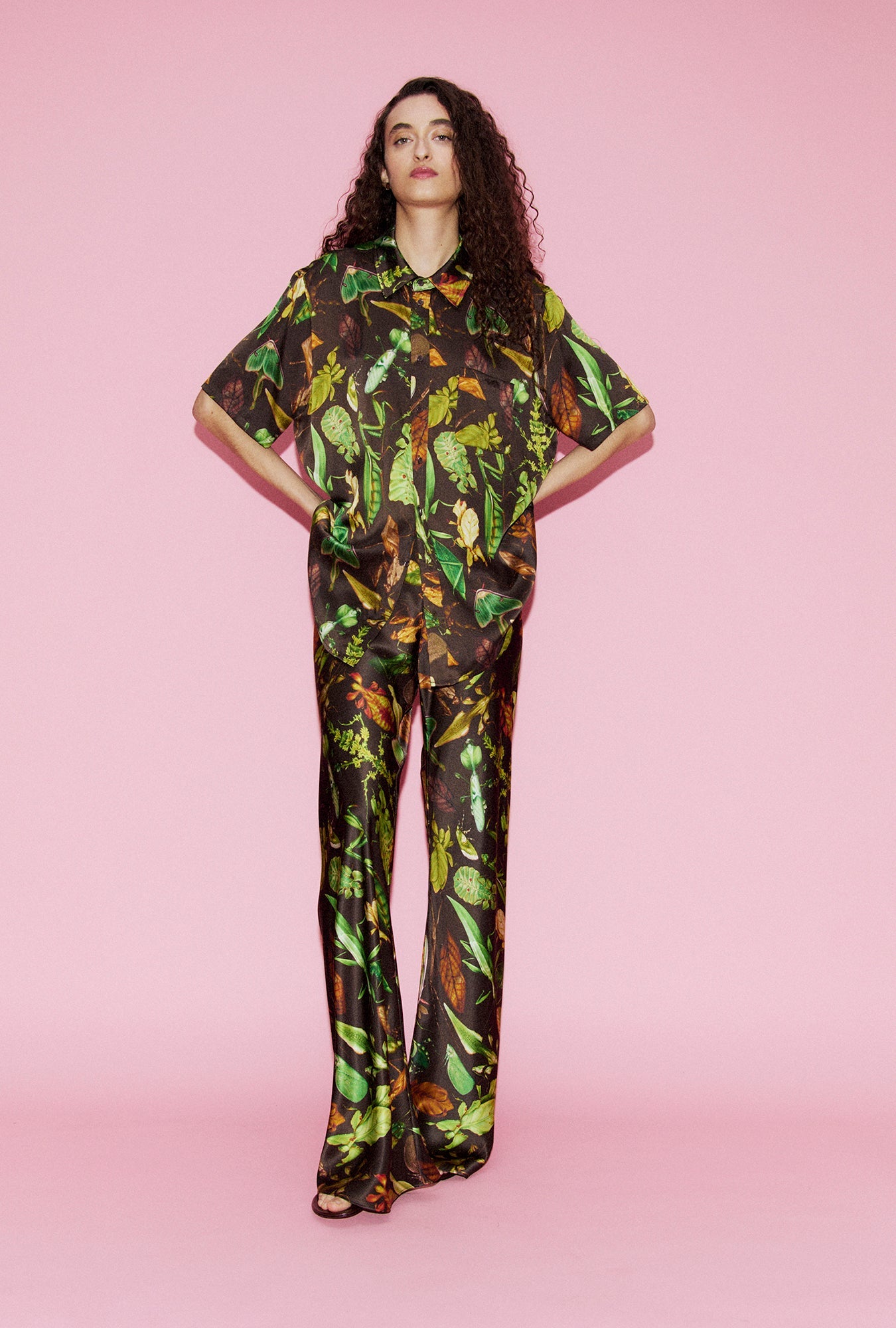 Image of a model wearing Tops. Product name - Short Sleeve Boyfriend Shirt Bug Camo in Bug Camo colour by brand - Silk Laundry