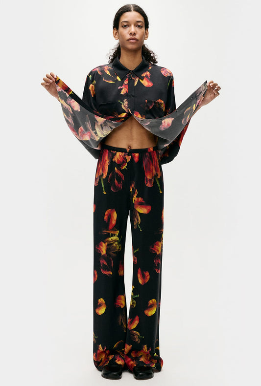 Image of a model wearing Pants. Productname: Silk Laundry Bias Cut Pants in Tulipa Black colour by brand - Silk Laundry