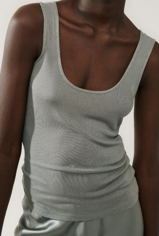 Image of a model wearing Tops. Productname: Silk Laundry RIBBED TANK in Moon colour by brand - Silk Laundry