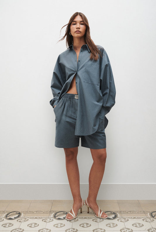 Image of a model wearing Pants. Productname: Cotton Silk Boxers Slate in Slate colour by brand - Silk Laundry