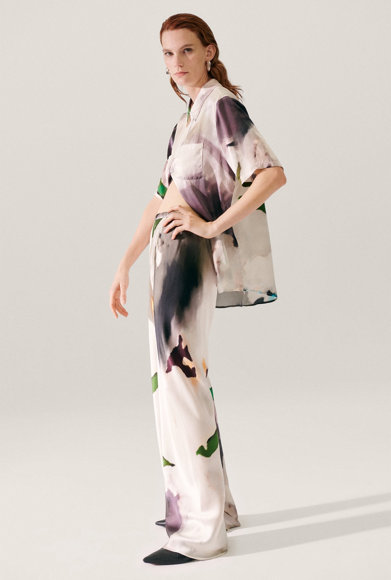 Image of a model wearing Pants. Product name - Bias Cut Pants Phosphate in Phosphate colour by brand - Silk Laundry
