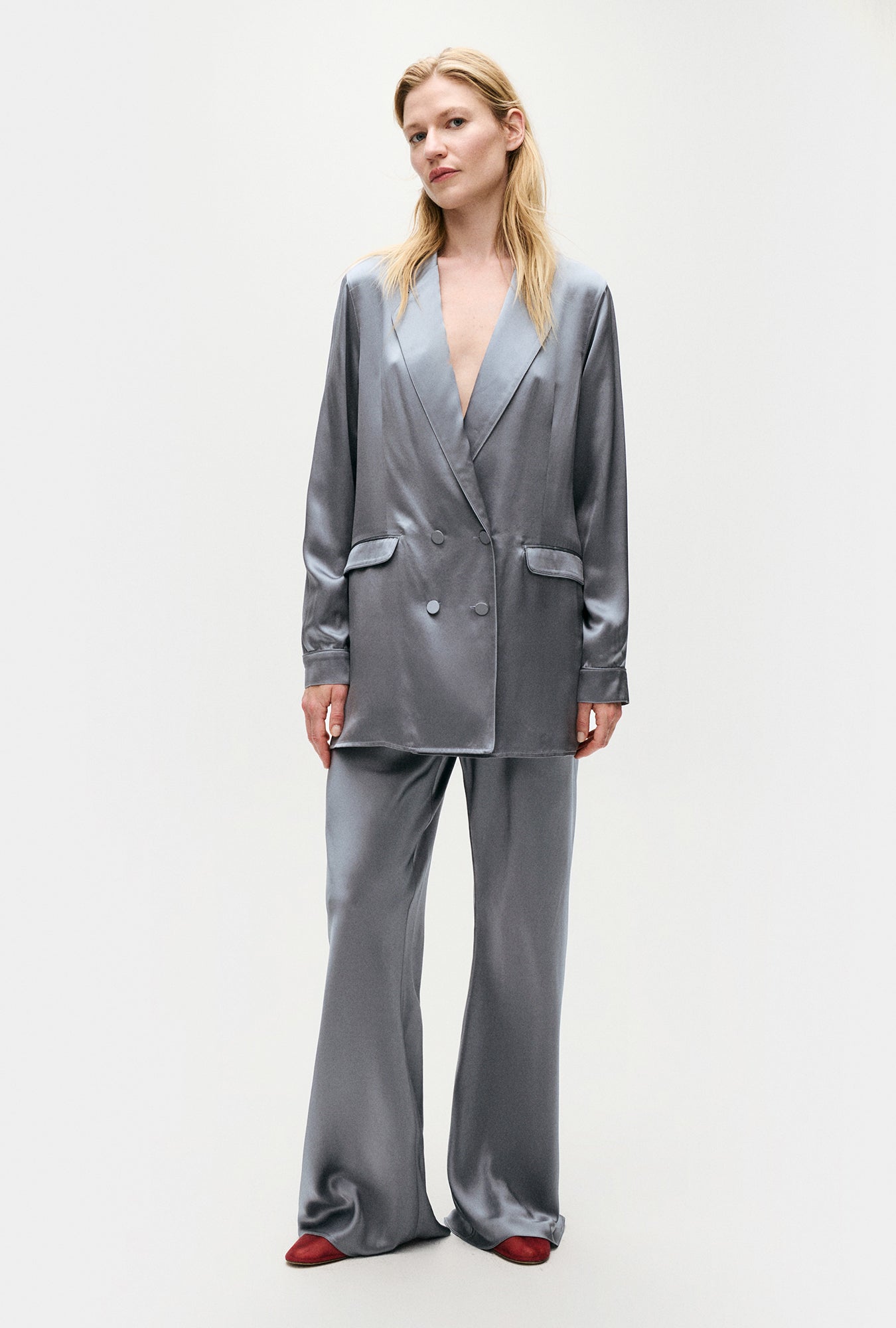 Image of a model wearing Outerwear. Product name - Relaxed Blazer Storm in Storm colour by brand - Silk Laundry