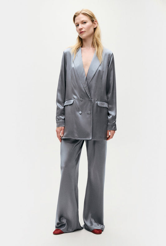 Image of a model wearing Outerwear. Product name - Relaxed Blazer Storm in Storm colour by brand - Silk Laundry