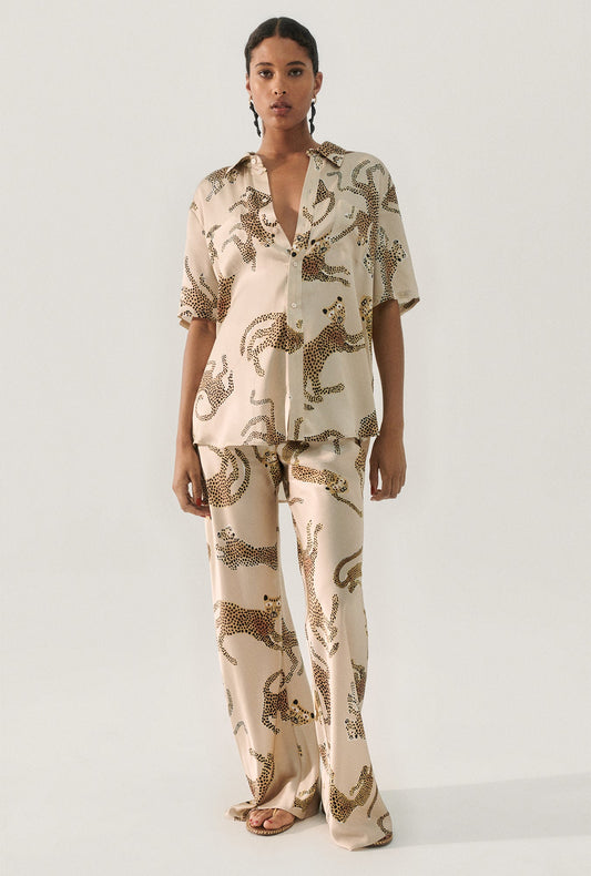 Image of a model wearing Pants. Productname: Bias Cut Pants Jaguars Hazelnut in Jaguars Hazelnut colour by brand - Silk Laundry