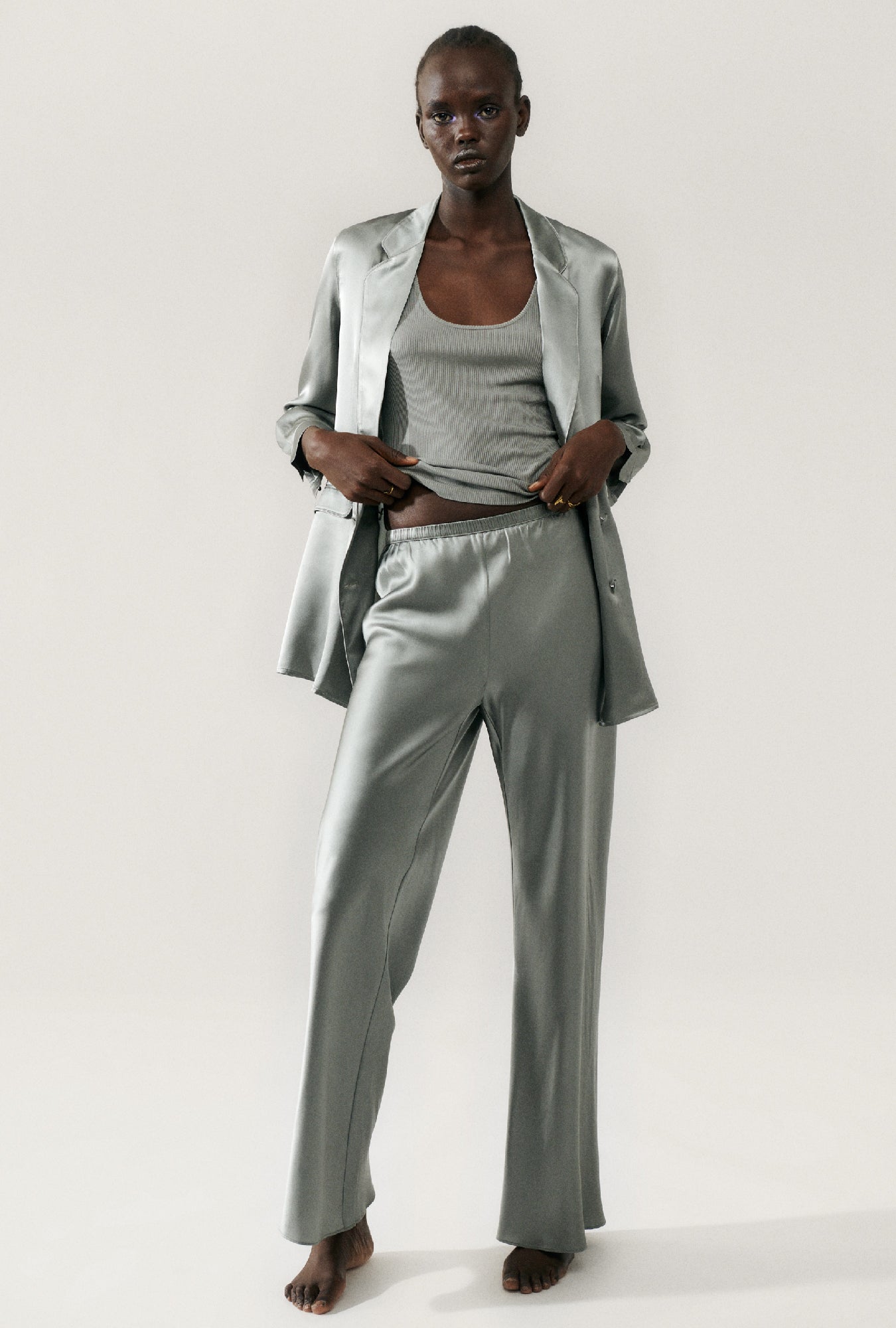 Image of a model wearing Pants. Product name - Bias Cut Pants Moon in Moon colour by brand - Silk Laundry