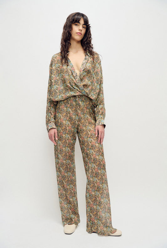 Image of a model wearing Pants. Product name - Chiffon Bias Cut Pants Sugar Floral in Sugar Floral colour by brand - Silk Laundry