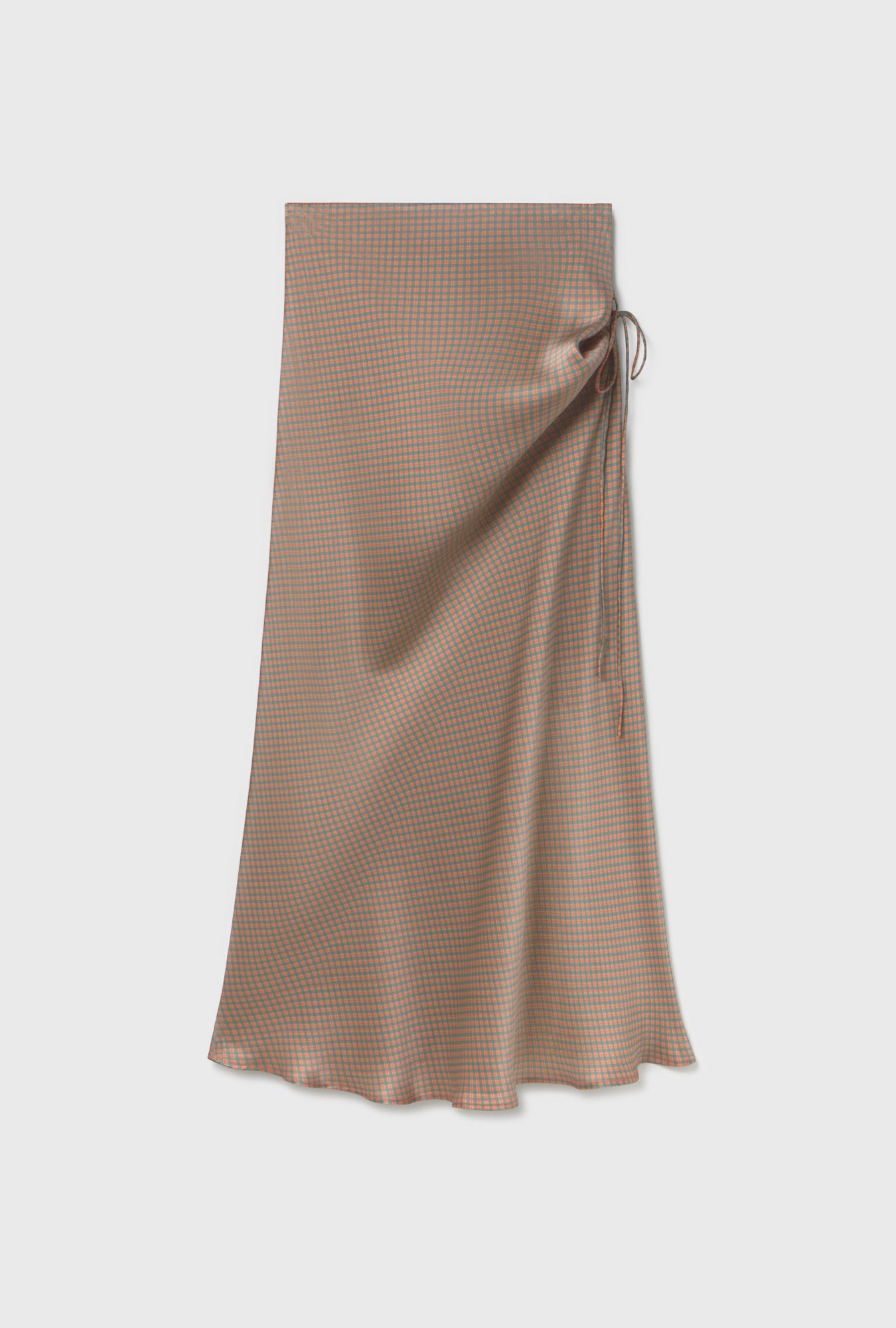 Image of a model wearing Skirts. Product name - Long Bias Cut Skirt Micro Plaid in Micro Plaid colour by brand - Silk Laundry