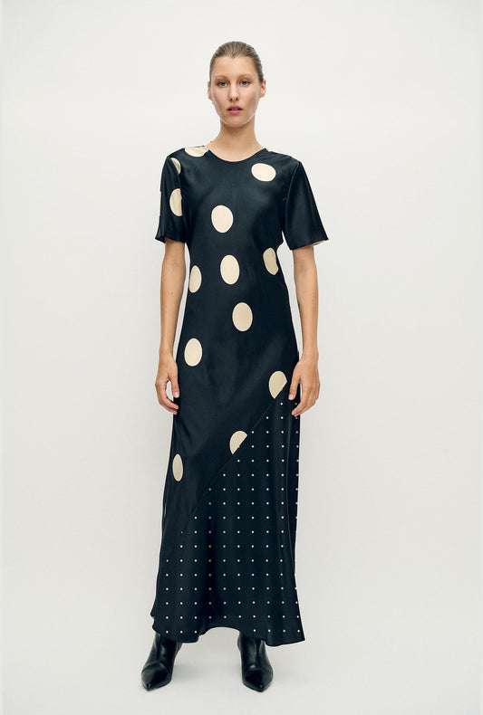 Image of a model wearing Tops. Product name - Short Sleeve Bias Dress Polka Mix in Polka Mix colour by brand - Silk Laundry