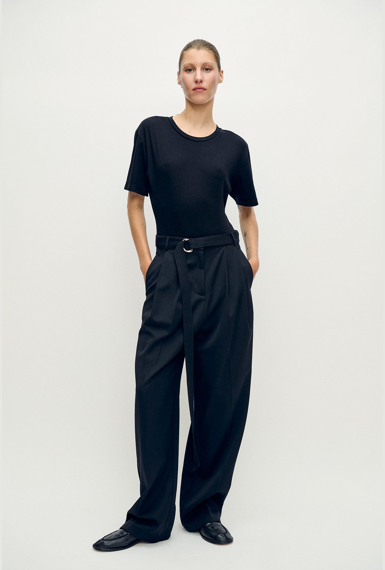 Image of Bodysuits. Product name - Bodysuit Tee Black in Black colour by brand - Silk Laundry