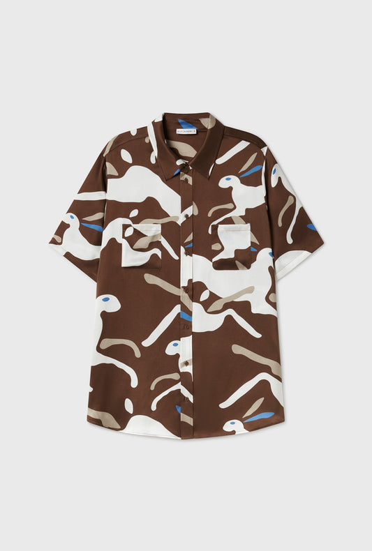 Image of a model wearing Tops. Productname: Short Sleeve Boyfriend Shirt Rabbit Dark Earth in Rabbit Dark Earth colour by brand - Silk Laundry