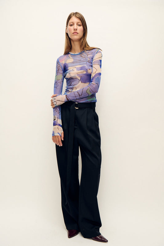 Image of a model wearing Tops. Productname: Mesh Long Sleeve Top Cornflower Floral in Cornflower Floral colour by brand - Silk Laundry