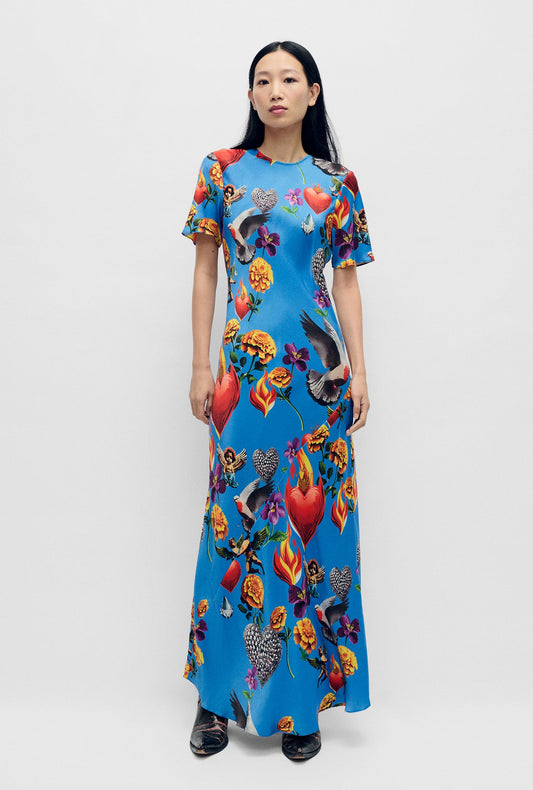 Image of a model wearing Tops. Product name - Short Sleeve Bias Dress Dearly Beloved Mirage in Dearly Beloved Mirage colour by brand - Silk Laundry
