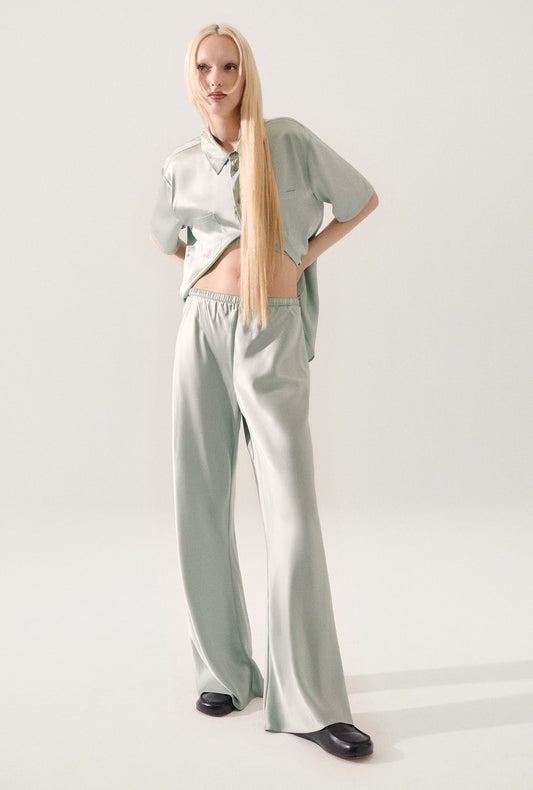 Image of a model wearing Pants. Productname: Bias Cut Pants Alabaster in Alabaster colour by brand - Silk Laundry