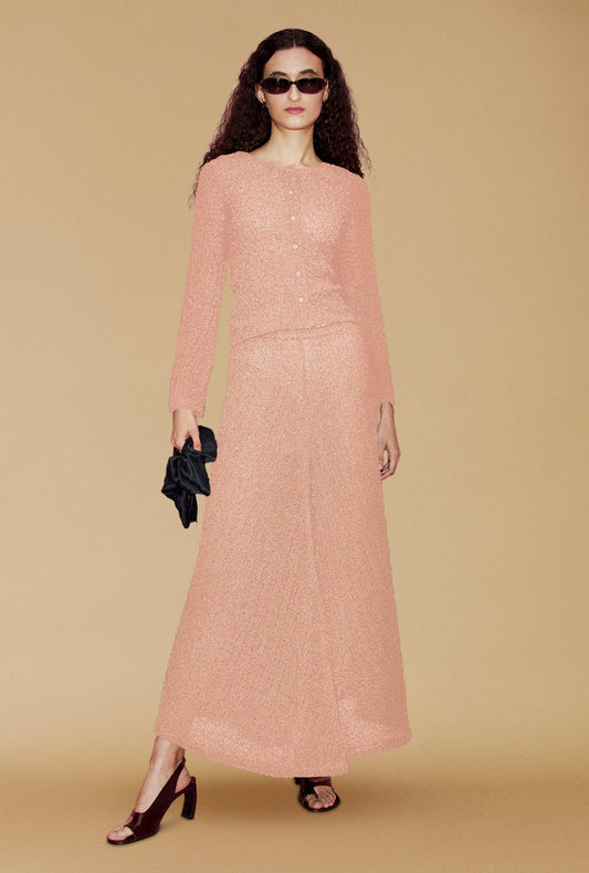 Image of a model wearing Tops. Product name - Pebble Long Sleeve Elena Top Orchid in Orchid colour by brand - Silk Laundry