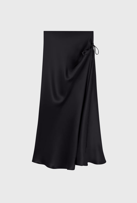 Image of a model wearing Skirts. Productname: Long Bias Cut Skirt Black in Black colour by brand - Silk Laundry
