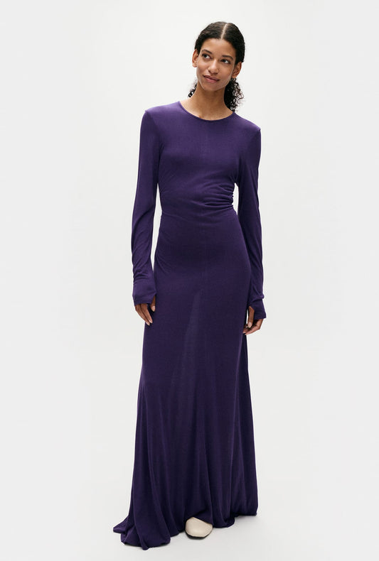 Image of a model wearing Tops. Product name - Jersey Modal Cutaway Dress Nightshade in Nightshade colour by brand - Silk Laundry
