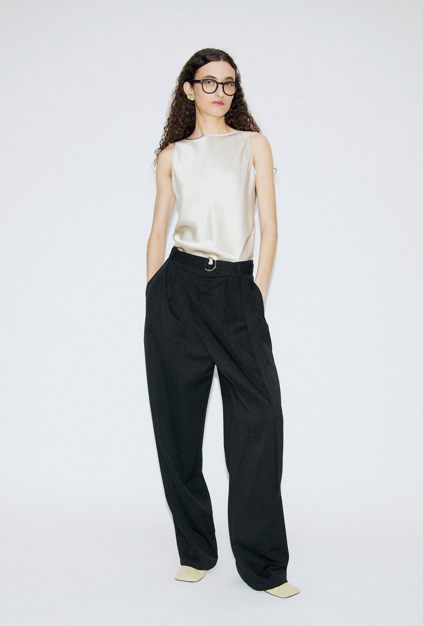Image of a model wearing Tops. Product name - Masia Top Hazelnut in Hazelnut colour by brand - Silk Laundry
