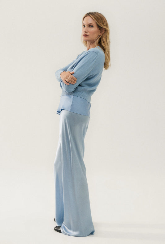 Image of a model wearing Tops. Productname: Silk Laundry CROPPED CARDIGAN in Sky colour by brand - Silk Laundry