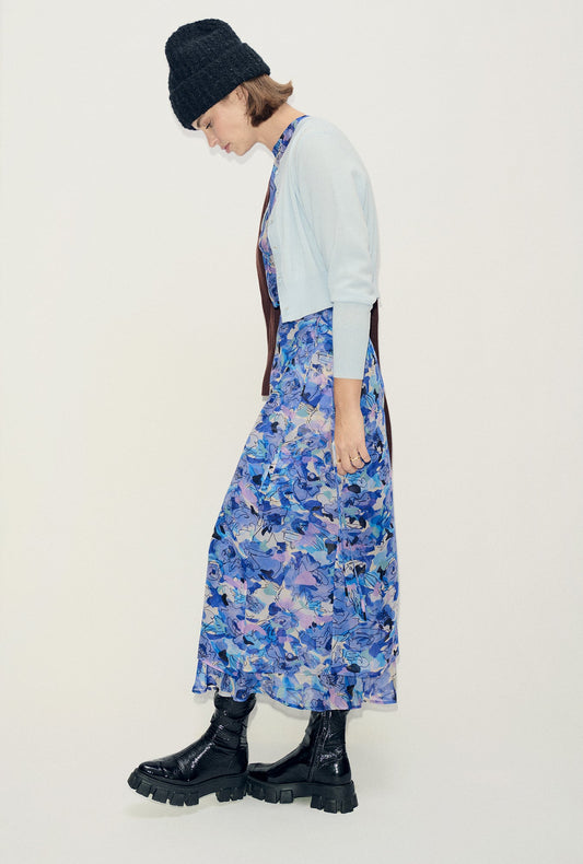 Image of a model wearing Skirts. Productname: Chiffon Wrap Skirt Cornflower Floral in Cornflower Floral colour by brand - Silk Laundry
