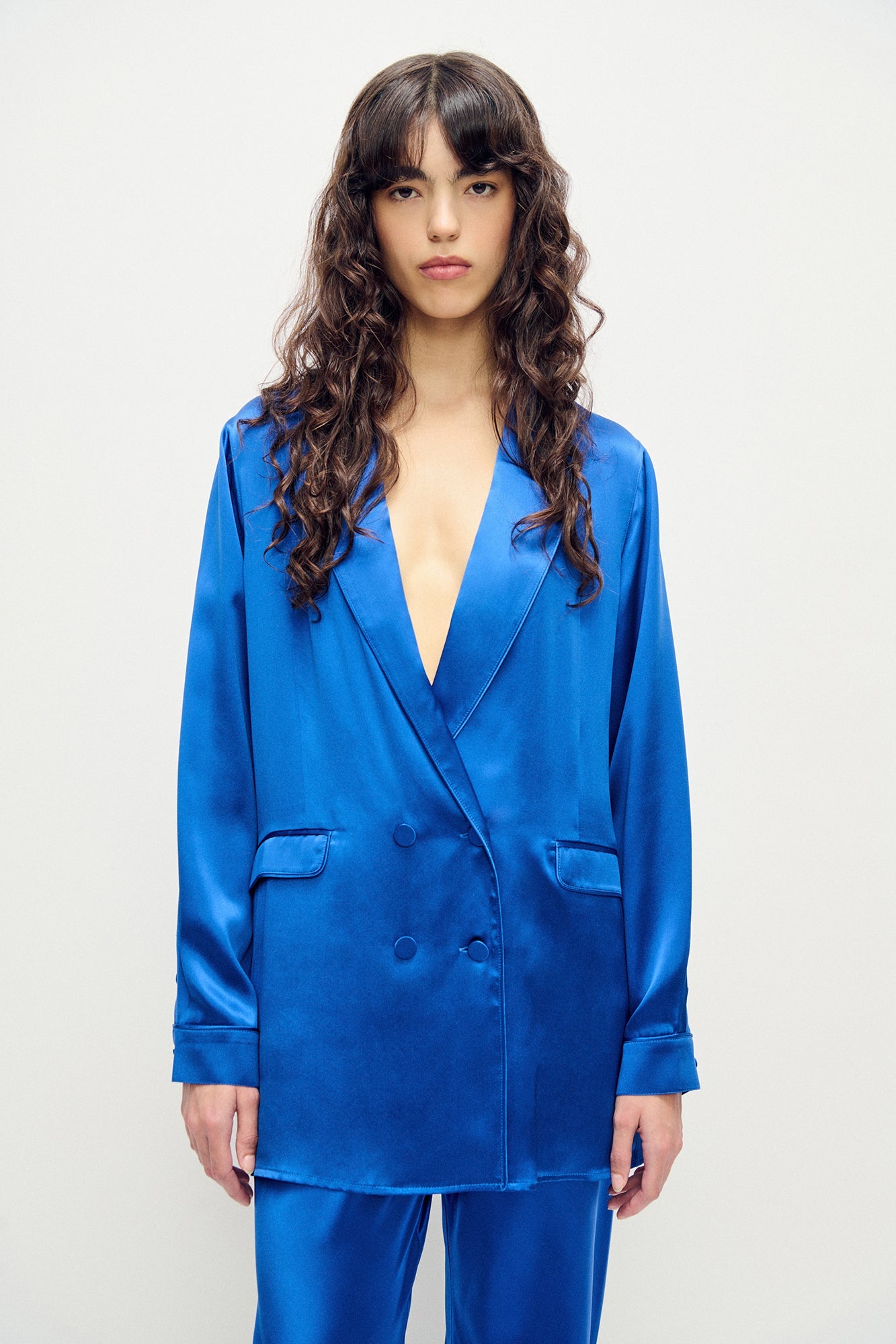 Image of a model wearing Outerwear. Product name - Relaxed Blazer Wedgwood in Wedgwood colour by brand - Silk Laundry