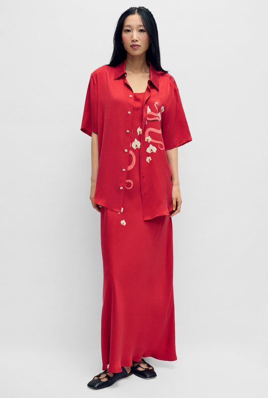 Image of a model wearing Tops. Product name - Short Sleeve Boyfriend Shirt Year of The Snake in Year Of The Snake colour by brand - Silk Laundry