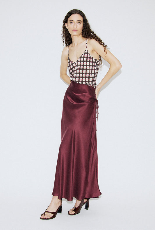 Image of a model wearing Tops. Product name - CDC Bias Cut Cami Luna Gingham in Luna Gingham colour by brand - Silk Laundry