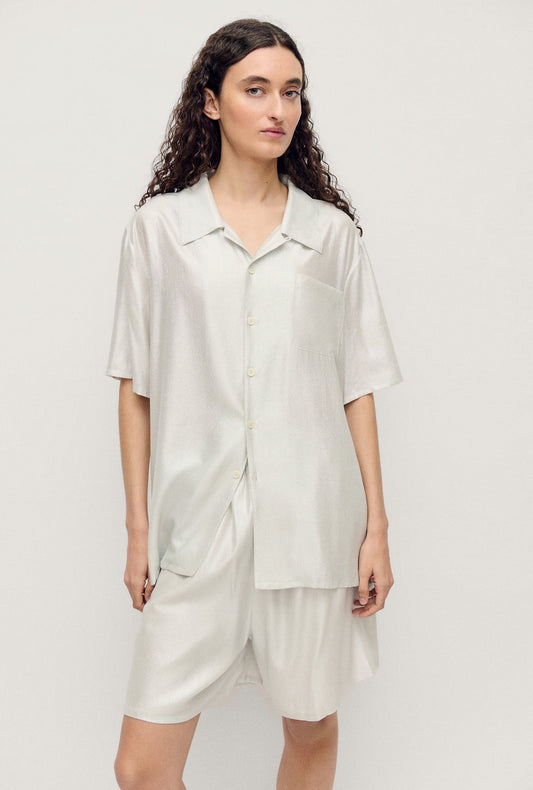Image of a model wearing Tops. Productname: Silk Laundry Camp Shirt in Silver Foil colour by brand - Silk Laundry