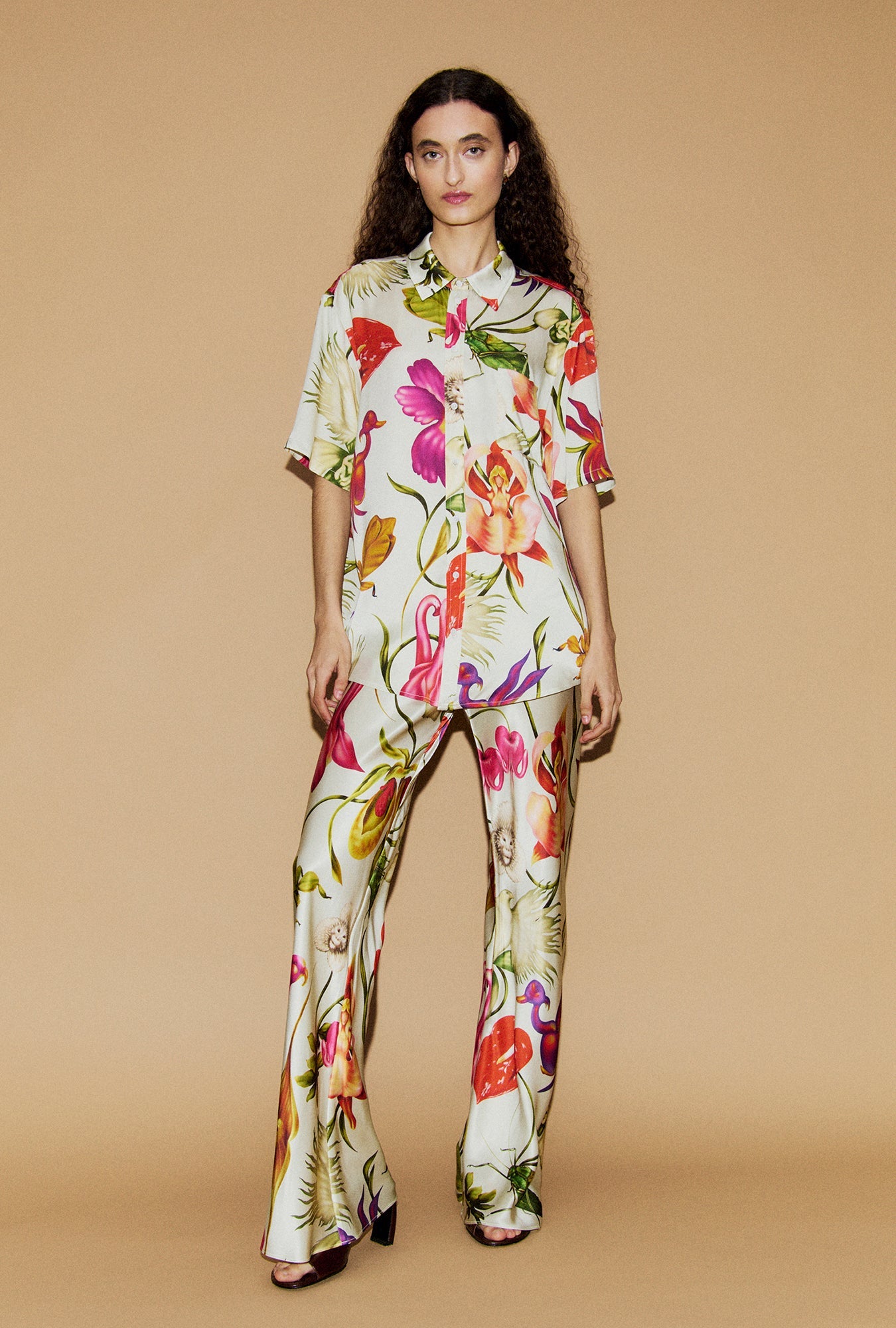 Image of a model wearing Pants. Product name - Bias Cut Pants Wonderland in Wonderland colour by brand - Silk Laundry