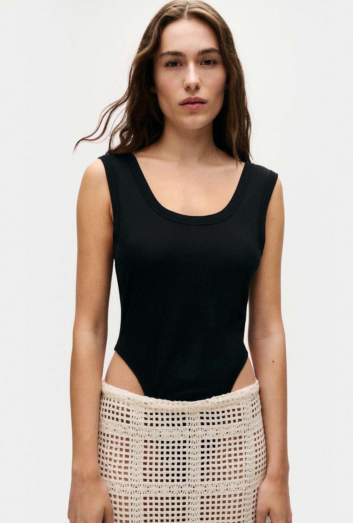 Image of Bodysuits. Product name - Cutaway Bodysuit Black in Black colour by brand - Silk Laundry