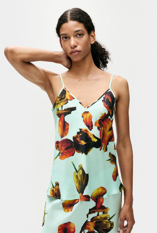 Image of a model wearing Tops. Product name - Bias Cut Cami Tulipa Dew in Tulipa Dew colour by brand - Silk Laundry